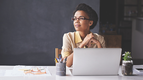 A person sitting in front of a laptop illustrates how important it is to be able to deliver a 360-degree view of your customers and get the return on your investment in Salesforce. | Informatica